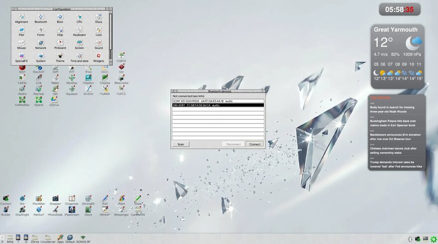 A light silver RISC OS desktop in the Shield theme, with the Configuration window, a Bluetooth devices window and weather and news widgets over a pale crystal wallpaper